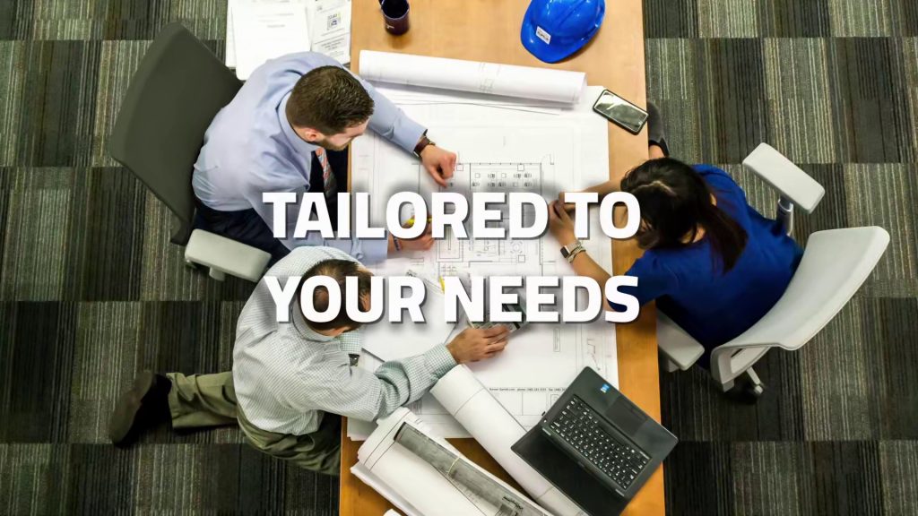Team working on architectural plans for custom modular furniture layout
